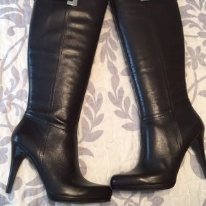 Dark brown leather boots.